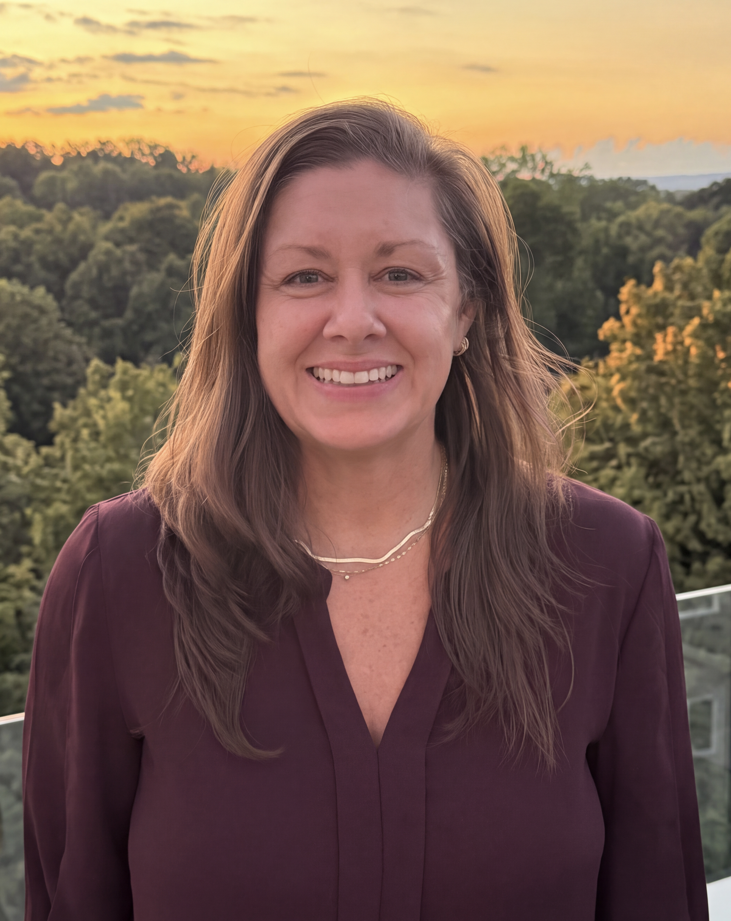 Wall Residences Residential Regional Director Angela Newman standing outside