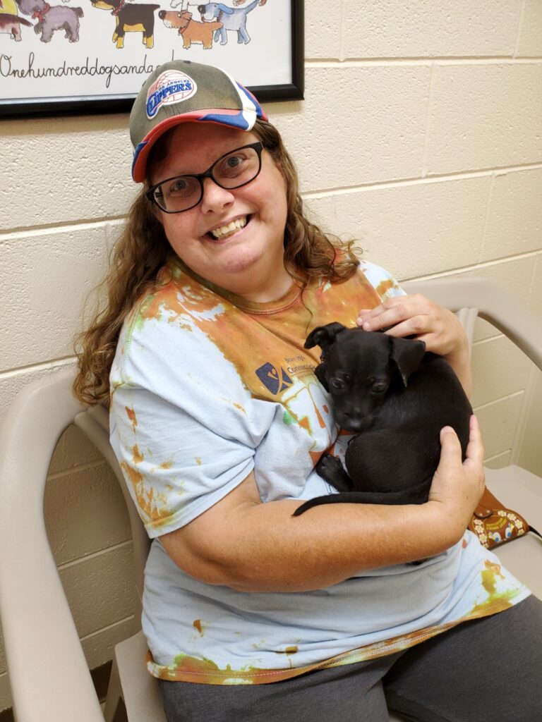 Supported Living Individual with puppy